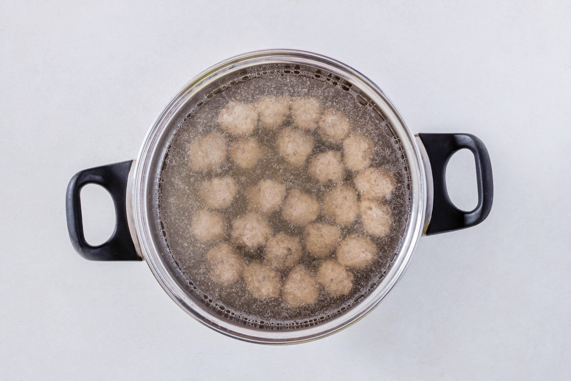 soup-with-meatballs-in-a-silver-pot