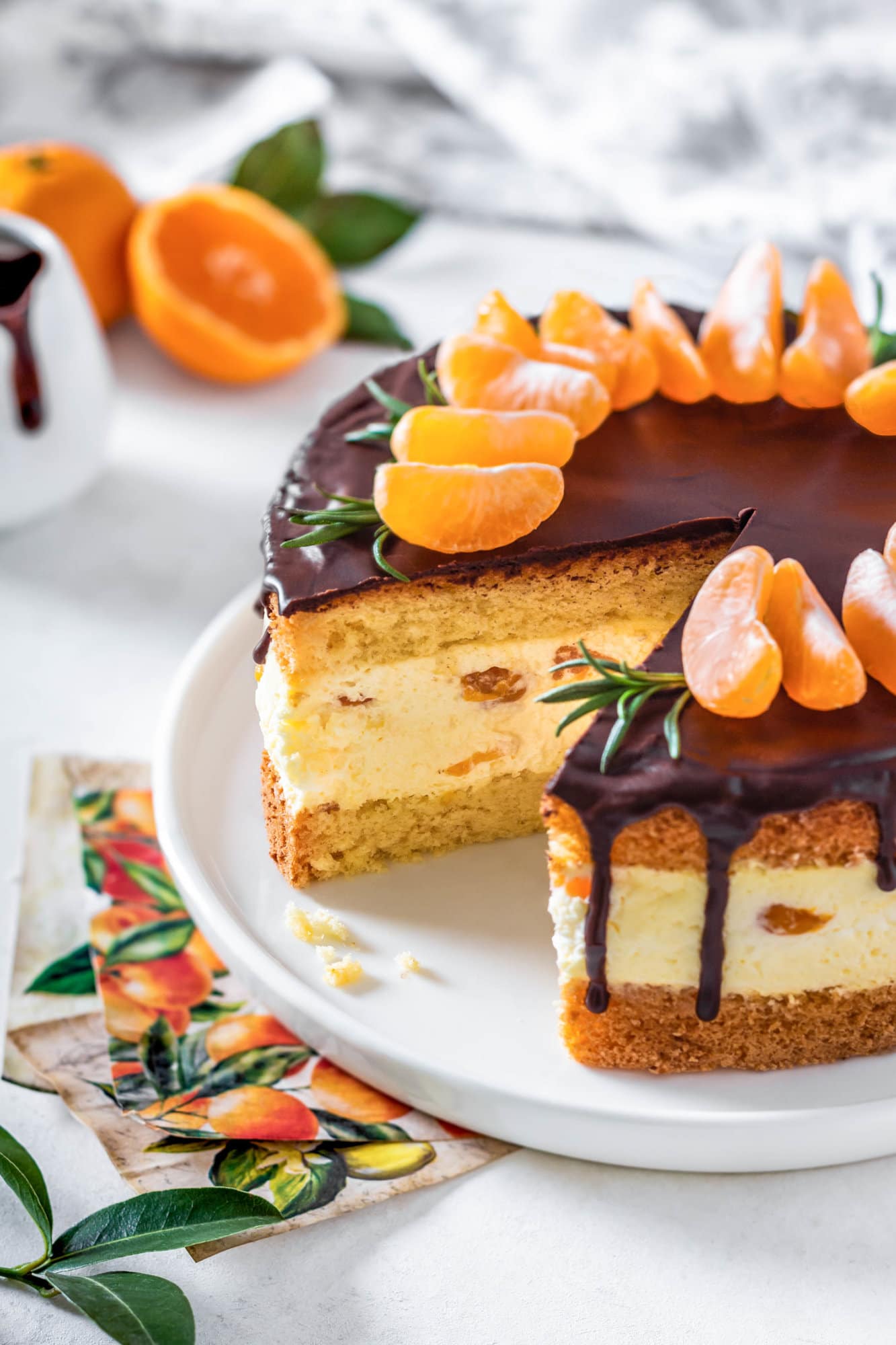 Mandarin Orange Cake with Citrus Mousse and Chocolate Ganache mandarin-mousse-cake-on-white-plate