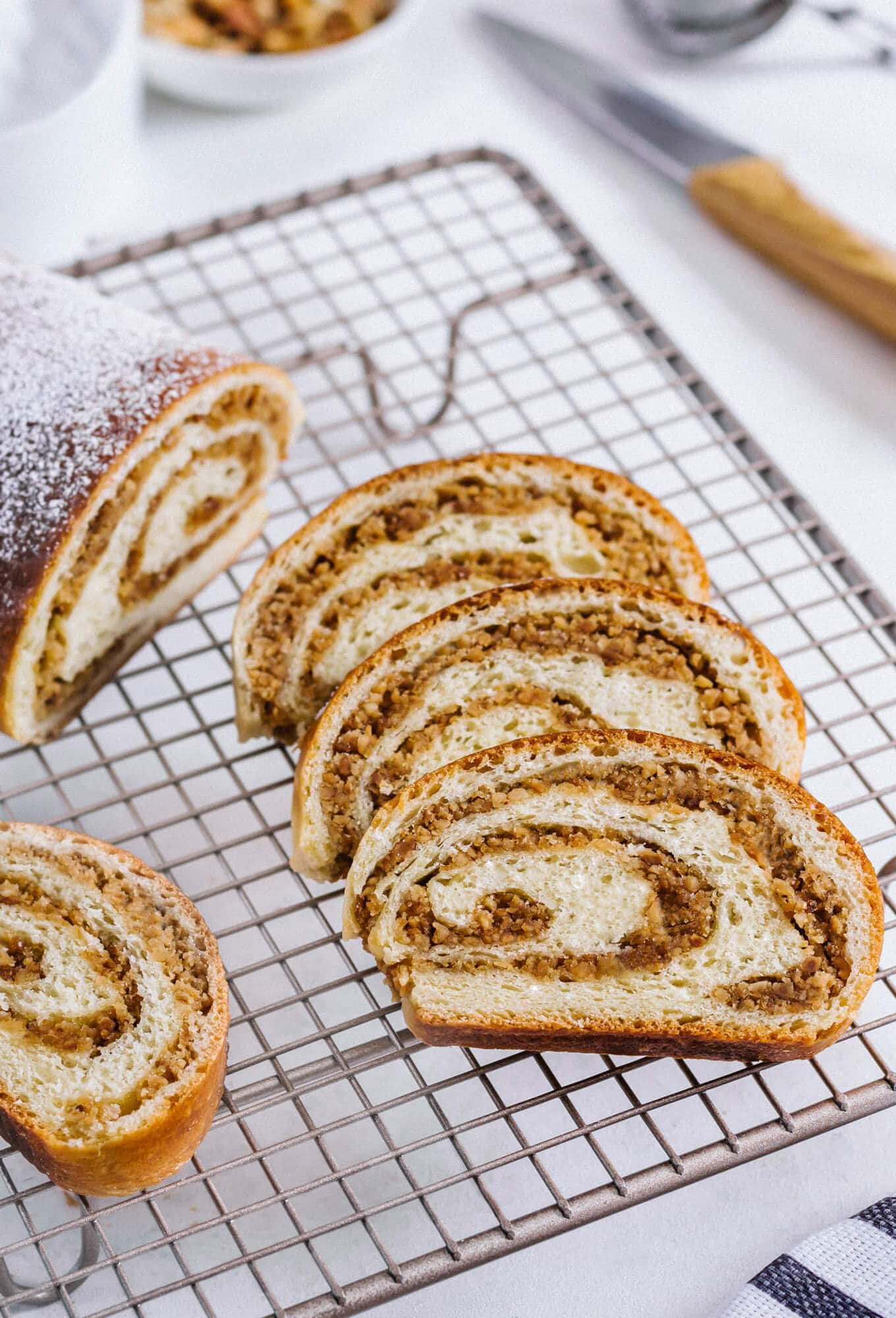 Sweet and Soft Russian Walnut Roll (Orechovnik) russian-walnut-roll-sliced-on-wire-rack